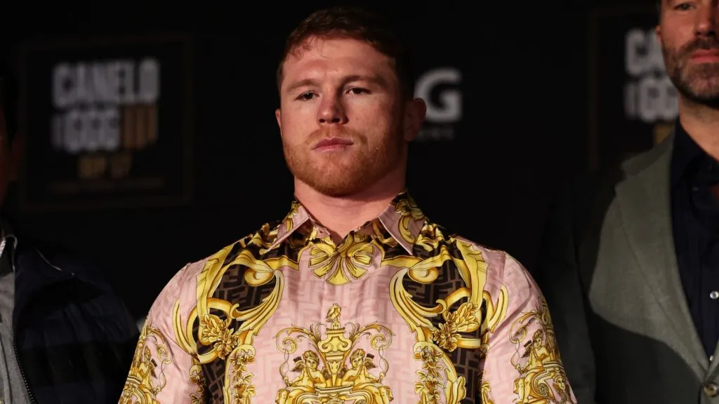 Canelo Alvarez poses with his championship belts at the end of the press conference during the press tour for his fight against Gennady Golovkin on June 27, 2022. (Source: Dustin Satloff/Getty Images)