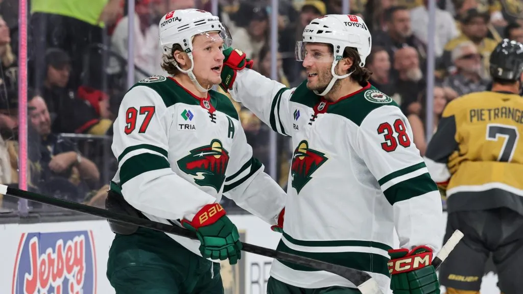 Kirill Kaprizov #97 and Ryan Hartman #38 of the Minnesota Wild celebrate Kaprizov’s first-period power-play goal against the Vegas Golden Knights in Game Five of the First Round of the 2025 Stanley Cup Playoffs at T-Mobile Arena on April 29, 2025 in Las Vegas, Nevada. (Photo by Ethan Miller/Getty Images)