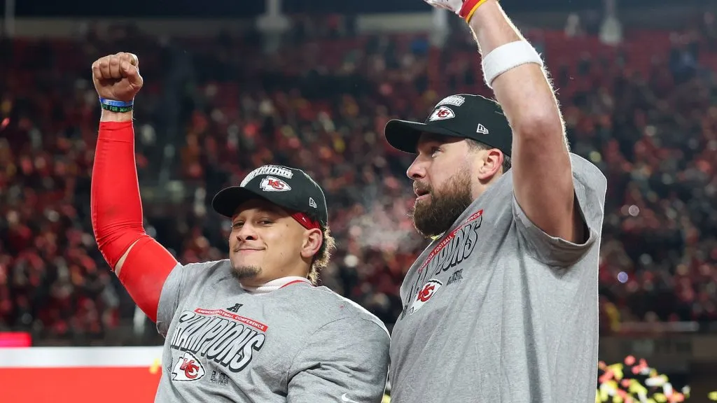 Patrick Mahomes #15 and Travis Kelce #87 of the Kansas City Chiefs celebrate after defeating the Buffalo Bills 32-29 in the AFC Championship Game at GEHA Field on January 26, 2025. (Source: Jamie Squire/Getty Images)