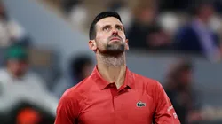 Novak Djokovic of Serbia reacts against Lorenzo Musetti of Italy in the Men's Singles third round match at Roland Garros.