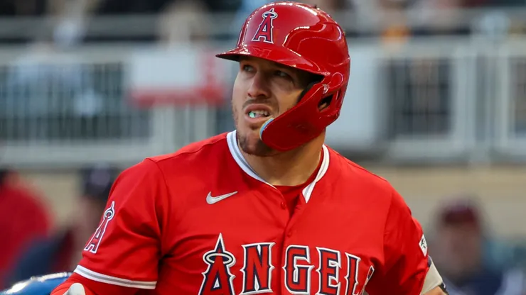 Mike Trout #27 of the Los Angeles Angels reacts after striking out against the Minnesota Twins in the third inning.