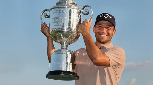 Xander Schauffele of the United States poses with the Wanamaker Trophy after winning the 2024 PGA Championship at Valhalla Golf Club on May 19, 2024.
