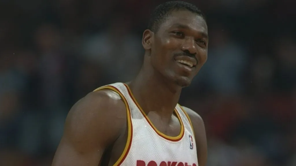 Center Hakeen Olajuwon of the Houston Rockets celebrates during a Finals game against the Orlando Magic in 1995. (Source: ALLSPORT USA /Allsport)