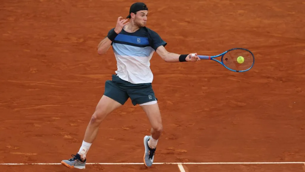 Jack Draper of Great Britain plays a return during his Madrid Open semifinal match against Lorenzo Musetti of Italy. (Clive Brunskill/Getty Images)