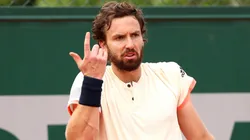 Ernests Gulbis of Latvia reacts during the mens singles first round match against of Roland Garros against Gilles Muller.