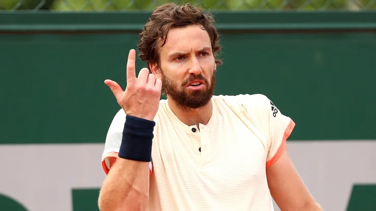 Ernests Gulbis of Latvia reacts during the mens singles first round match against of Roland Garros against Gilles Muller.