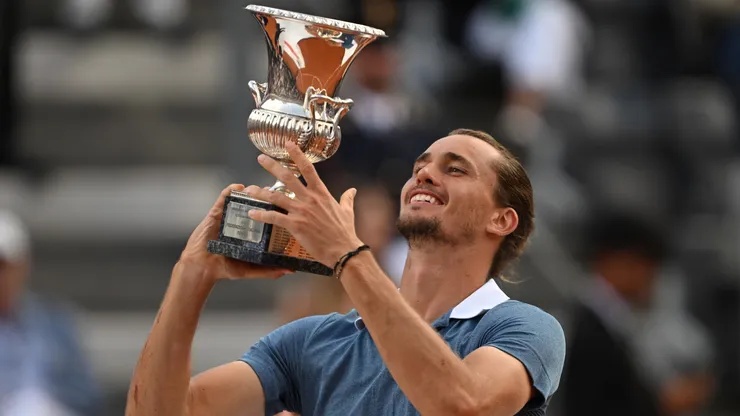 Alexander Zverev holding the Rome Open trophy in 2024.