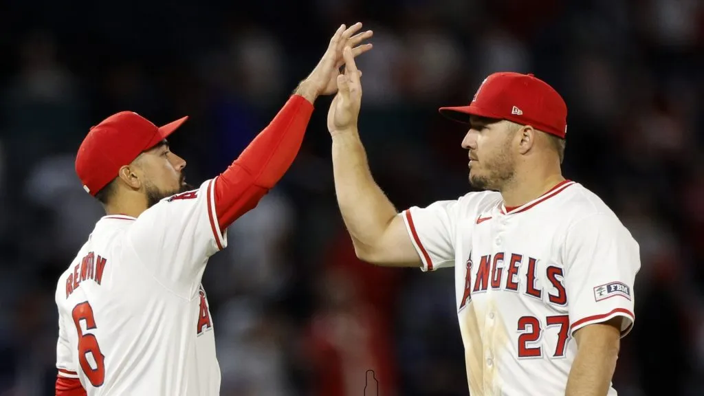Mike Trout #27 and Anthony Rendon #6 of the Los Angeles Angels celebrates a 7-1 win over the Tampa Bay Rays