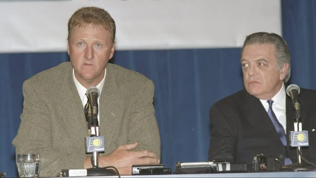 Larry Bird is introduced as the new Indiana Pacers head coach by team president Donnie Walsh. (Matthew Stockman /Allsport/ Getty Images)