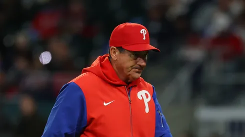 Manager Rob Thomson #59 of the Philadelphia Phillies walks off the field in the sixth inning against the Atlanta Braves. at Truist Park on April 08, 2025 in Atlanta, Georgia.