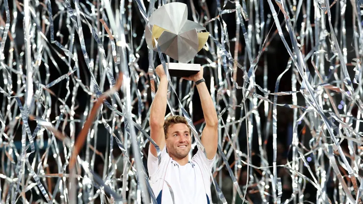 Casper Ruud of Norway celebrates with the trophy after his victory in the Men's Singles Final against Jack Draper of Great Britain on Day Thirteen of the Mutua Madrid Open at La Caja Magica on May 04, 2025 in Madrid, Spain.