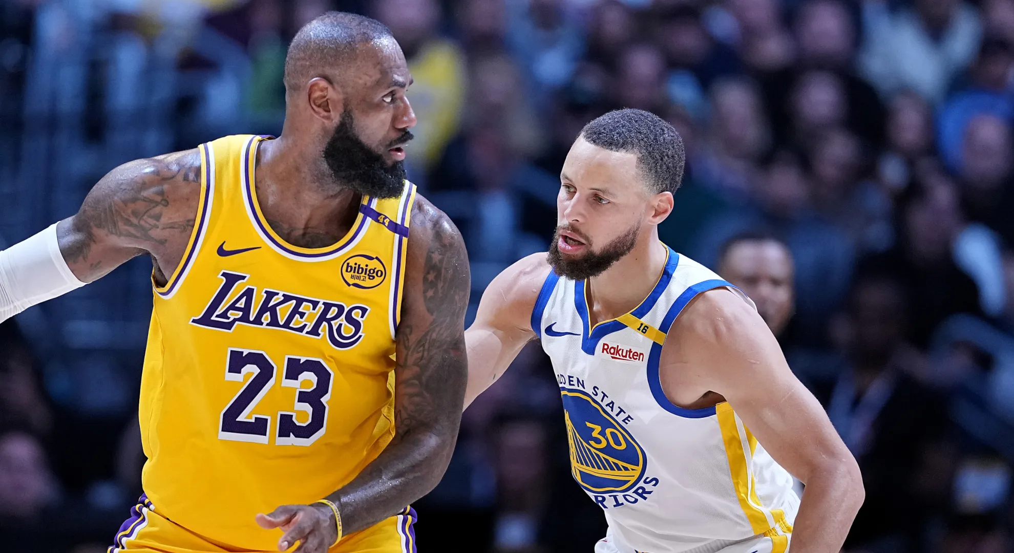 Stephen Curry and LeBron James playing against each other