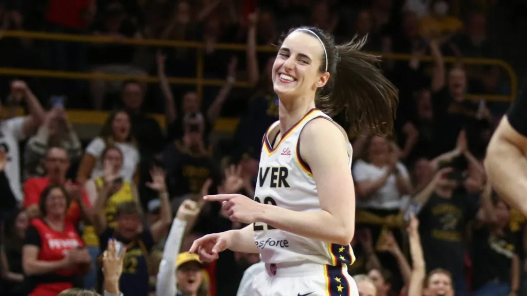 Caitlin Clark celebrates her three-pointer (Matthew Holst/Getty Images)