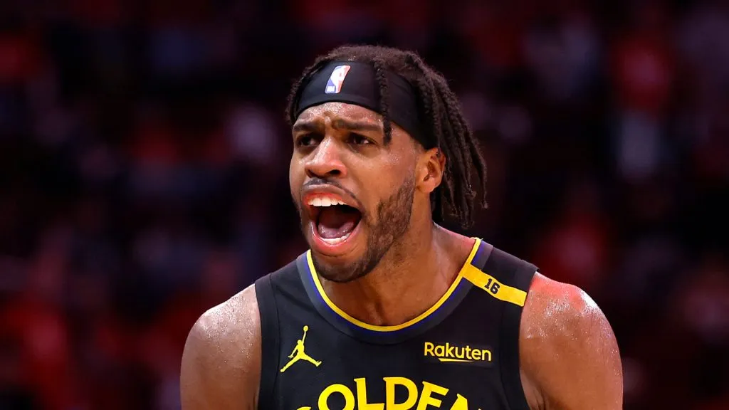 Buddy Hield #7 of the Golden State Warriors reacts against the Houston Rockets after making a three-point basket during the fourth quarter in Game Seven