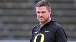 Head coach Dan Lanning of the Oregon Ducks watches as his team warms-up prior to their spring game at Autzen Stadium on April 26, 2025 in Eugene, Oregon.