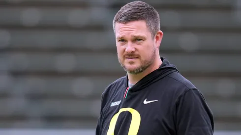 Head coach Dan Lanning of the Oregon Ducks watches as his team warms-up prior to their spring game at Autzen Stadium on April 26, 2025 in Eugene, Oregon.