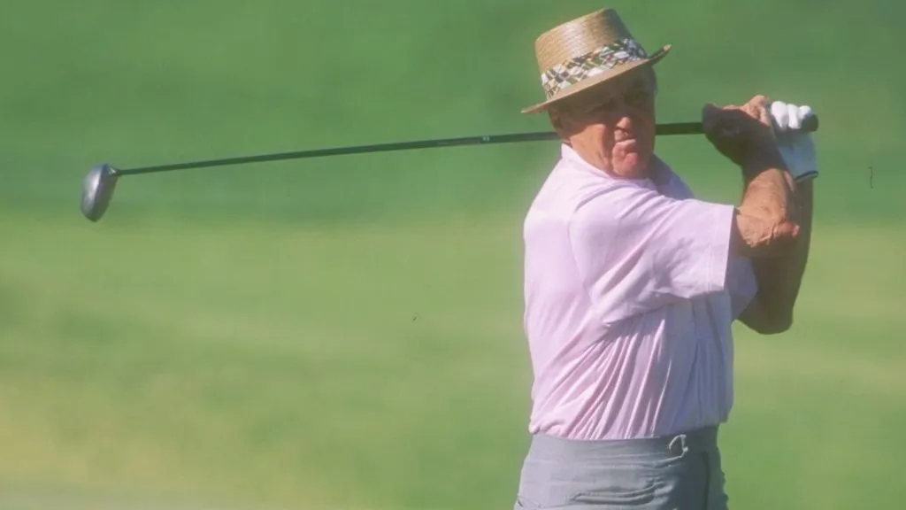 Sam Snead eyes his shot during the Legends of Golf tournament at the PGA West Stadium Course in 1996. (Source: J.D. Cuban /Allsport – Getty Images)