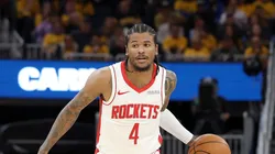 Jalen Green #4 of the Houston Rockets dribbles the ball against the Golden State Warriors in Game Six of the Western Conference First Round NBA Playoffs