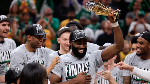 Jaylen Brown #7 of the Boston Celtics accepts The Larry Bird Trophy after winning Game Four of the Eastern Conference Finals at Gainbridge Fieldhouse on May 27, 2024.