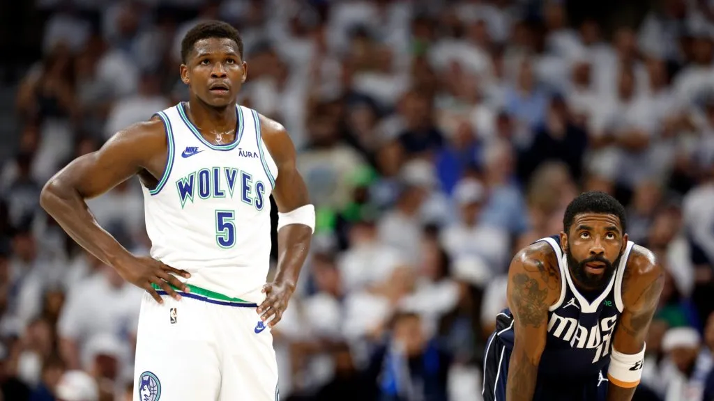 Anthony Edwards of the Minnesota Timberwolves and Kyrie Irving #11 of the Dallas Mavericks look on during the first quarter in Game One of the Western Conference Finals in 2024. (Source: David Berding/Getty Images)