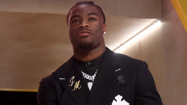Quarterback Jalen Milroe of Alabama walks onto the stage during the first round of the 2025 NFL Draft at Lambeau Field on April 24, 2025 in Green Bay, Wisconsin.
