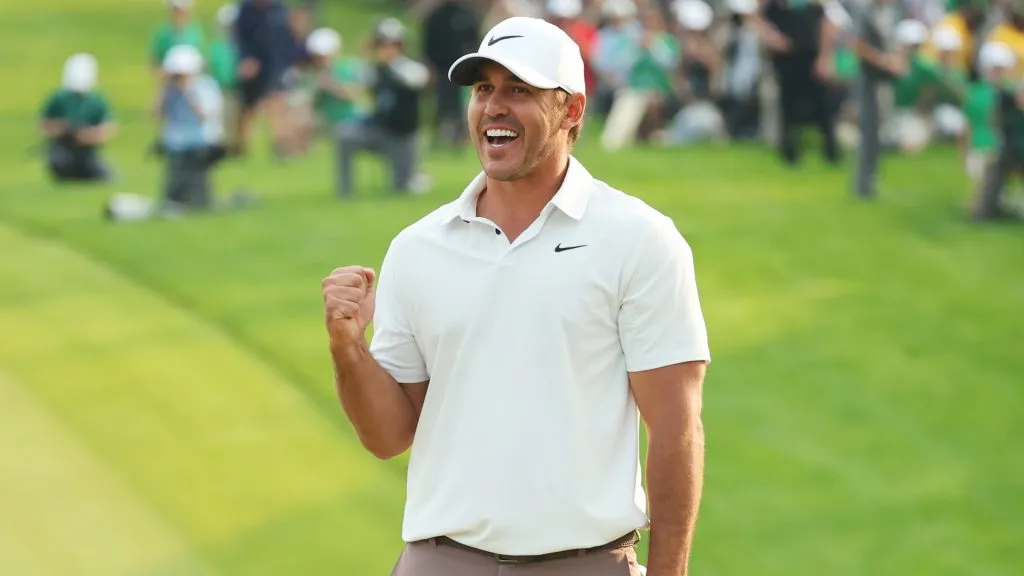 Brooks Koepka of the United States celebrates winning on the 18th green during the final round of the 2023 PGA Championship at Oak Hill Country Club on May 21, 2023. (Source: Michael Reaves/Getty Images)