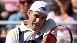 John Isner of the United States returns a shot in a final career match loss against Michael Mmoh of the United States during their Men's Singles Second Round match on Day Four of the 2023 US Open.