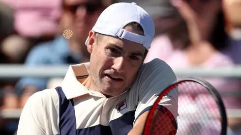 John Isner of the United States returns a shot in a final career match loss against Michael Mmoh of the United States during their Men's Singles Second Round match on Day Four of the 2023 US Open.