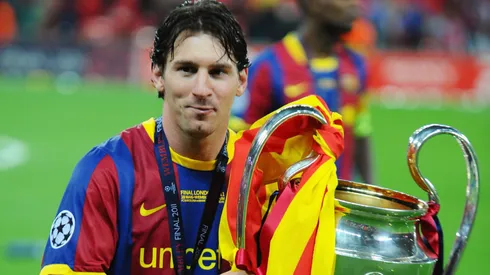 Lionel Messi with the Champions League trophy in 2011