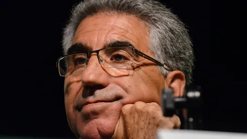 Manuel Orantes listens during a press conference prior to his induction into the International Tennis Hall Of Fame.