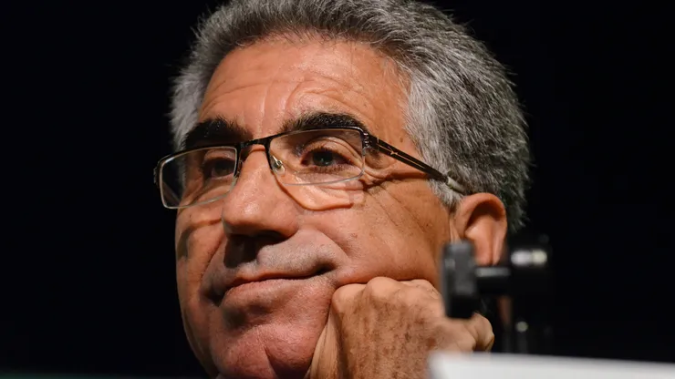 Manuel Orantes listens during a press conference prior to his induction into the International Tennis Hall Of Fame.