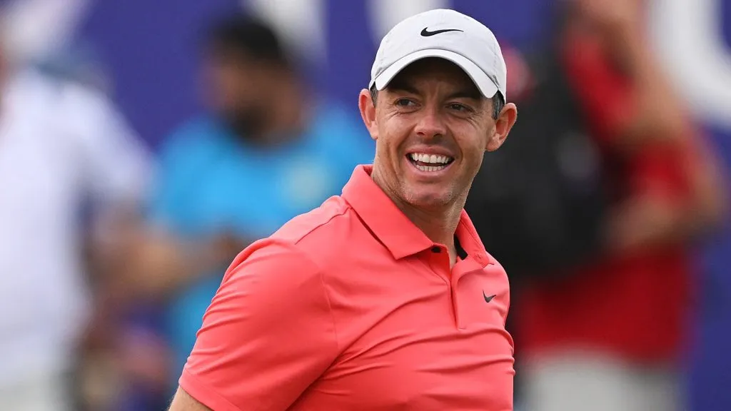Rory McIlroy of Northern Ireland smiles whilst leaving the 18th green during Day One of the DP World Tour Championship on the Earth Course on November 16, 2023. (Source: Ross Kinnaird/Getty Images)