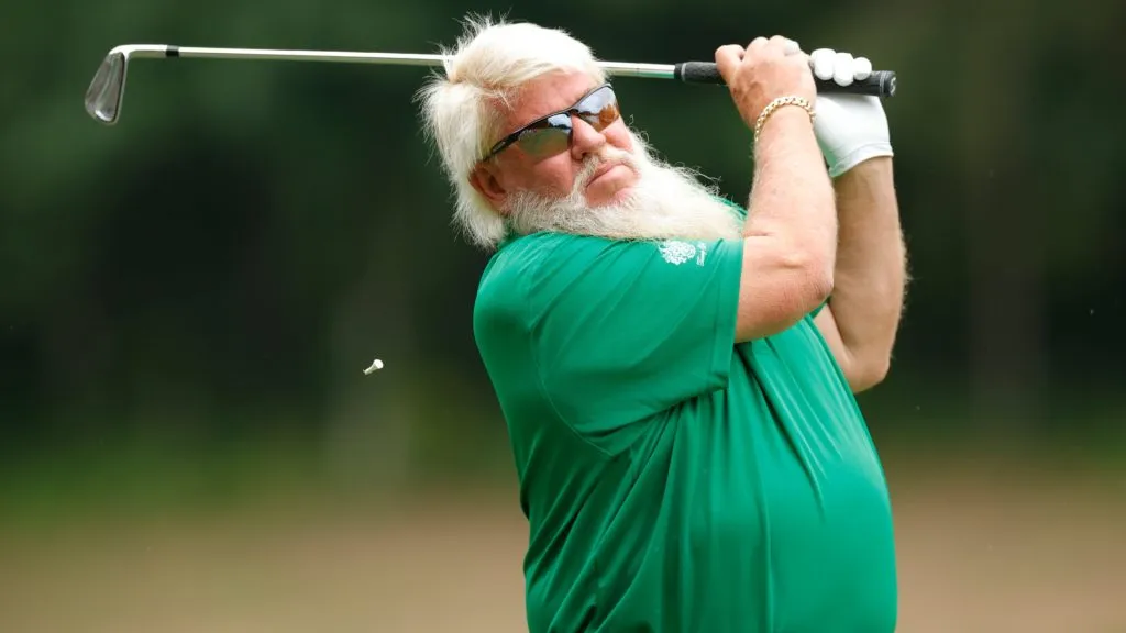 John Daly of the United States hits a tee shot on the fourth hole during the first round of the Regions Tradition at Greystone Golf and Country Club on May 11, 2023. (Source: Alex Slitz/Getty Images)
