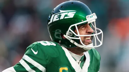 Aaron Rodgers #8 of the New York Jets reacts after throwing an interception against the Miami Dolphins during the first quarter at MetLife Stadium on January 05, 2025 in East Rutherford, New Jersey.