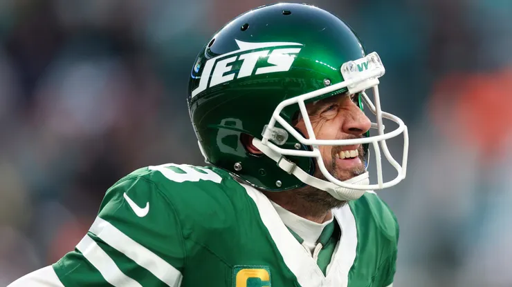Aaron Rodgers #8 of the New York Jets reacts after throwing an interception against the Miami Dolphins during the first quarter at MetLife Stadium on January 05, 2025 in East Rutherford, New Jersey.