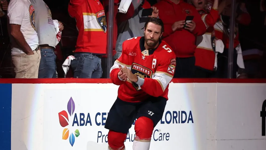 Aaron Ekblad #5 of the Florida Panthers gives his stick to a fan after defeating the Tampa Bay Lightning 4-2 in Game Four of the First Round of the 2025 Stanley Cup Playoffs at Amerant Bank Arena on April 28, 2025 in Sunrise, Florida.