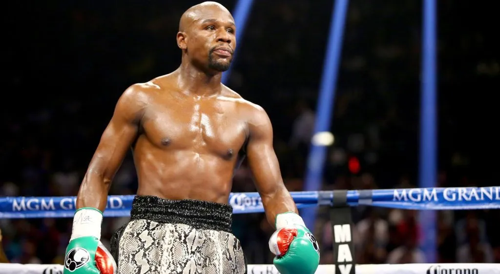 Floyd Mayweather Jr. looks on while taking on Marcos Maidana during their WBC/WBA welterweight title fight at the MGM Grand Garden Arena on September 13, 2014 in Las Vegas, Nevada. (Photo by Al Bello/Getty Images)