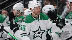 Mikko Rantanen #96 of the Dallas Stars celebrates with teammates after scoring a goal.