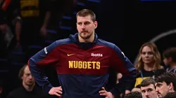 Nikola Jokic #15 of the Denver Nuggets stands at the end of the bench after fouling out during the second half of game two of the Western Conference semifinals against the Oklahoma City Thunder