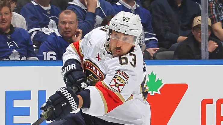 Brad Marchand #63 of the Florida Panthers has a shot blocked by Morgan Rielly #44 of the Toronto Maple Leafs during the first period in Game One of the second round of the 2025 Stanley Cup Playoffs at Scotiabank Arena on May 5, 2025 in Toronto, Ontario, Canada.