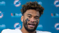 Tua Tagovailoa #1 of the Miami Dolphins speaks to the media after losing to the Green Bay Packers 30-17 at Lambeau Field on November 28, 2024 in Green Bay, Wisconsin.