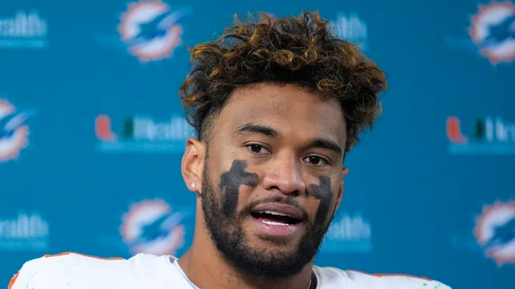 Tua Tagovailoa #1 of the Miami Dolphins speaks to the media after losing to the Green Bay Packers 30-17 at Lambeau Field on November 28, 2024 in Green Bay, Wisconsin.
