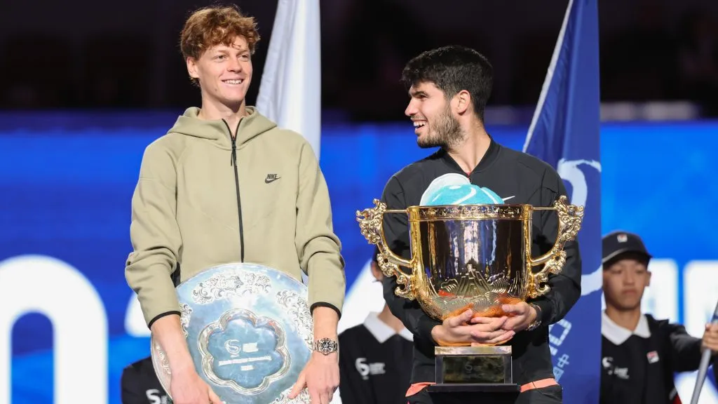 Carlos Alcaraz of Spain and Jannik Sinner of Italy poses with the winners trophy after the Men’s Singles Finals match of the China Open. (Lintao Zhang/Getty Images)