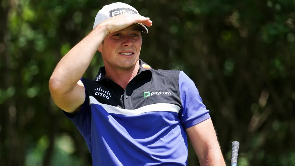 Viktor Hovland of Norway watches a tee shot on the third hole during the first round of the Truist Championship 2025 at The Wissahickon at Philadelphia Cricket Club on May 08, 2025. (Source: Emilee Chinn/Getty Images)