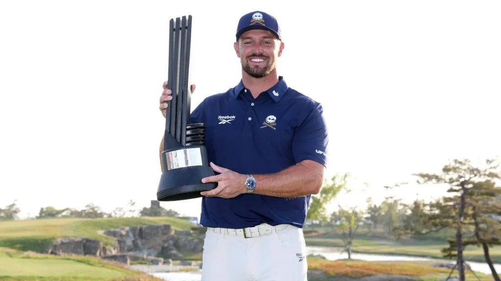 Bryson DeChambeau of Crushers GC celebrates with the trophy after winning the final round during day three of LIV GolfKorea at Jack Nicklaus GC Korea on May 04, 2025. (Source: Chung Sung-Jun/Getty Images)