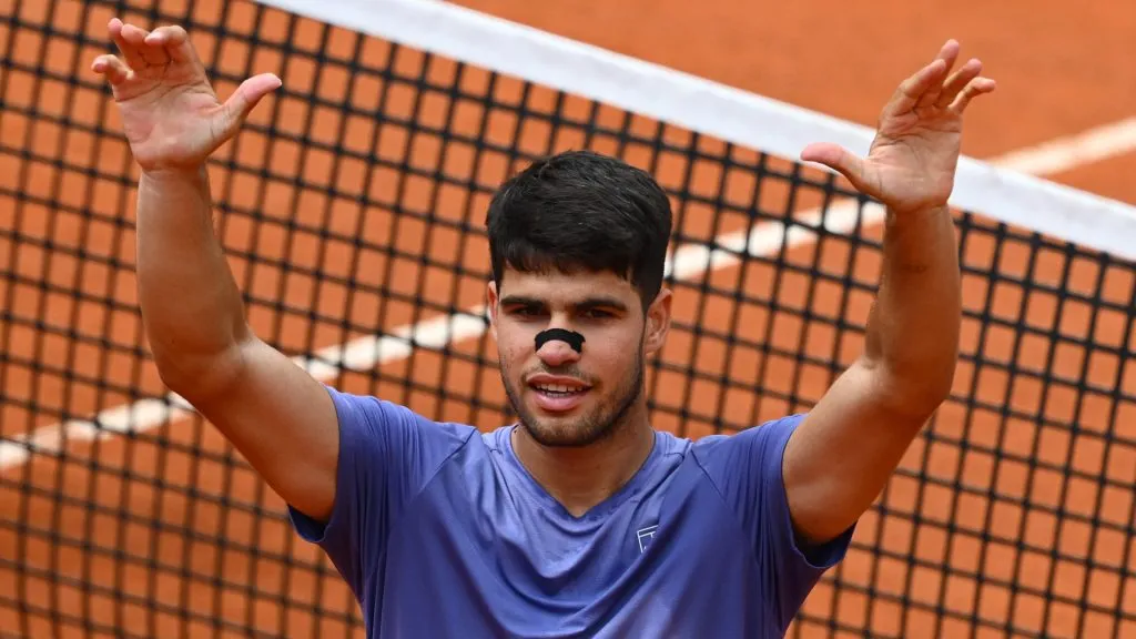 Carlos Alcaraz of Spain celebrates match point against Dusan Lajovic of Serbia in the Men’s Singles Second Round match during the Rome Open. (Clive Mason/Getty Images)
