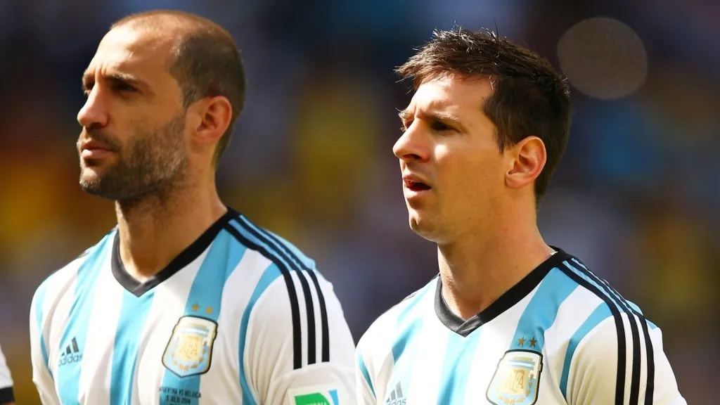 Lionel Messi and Pablo Zabaleta of Argentina look on prior to the 2014 FIFA World Cup Brazil Quarter Final match between Argentina and Belgium. (Clive Rose/Getty Images)