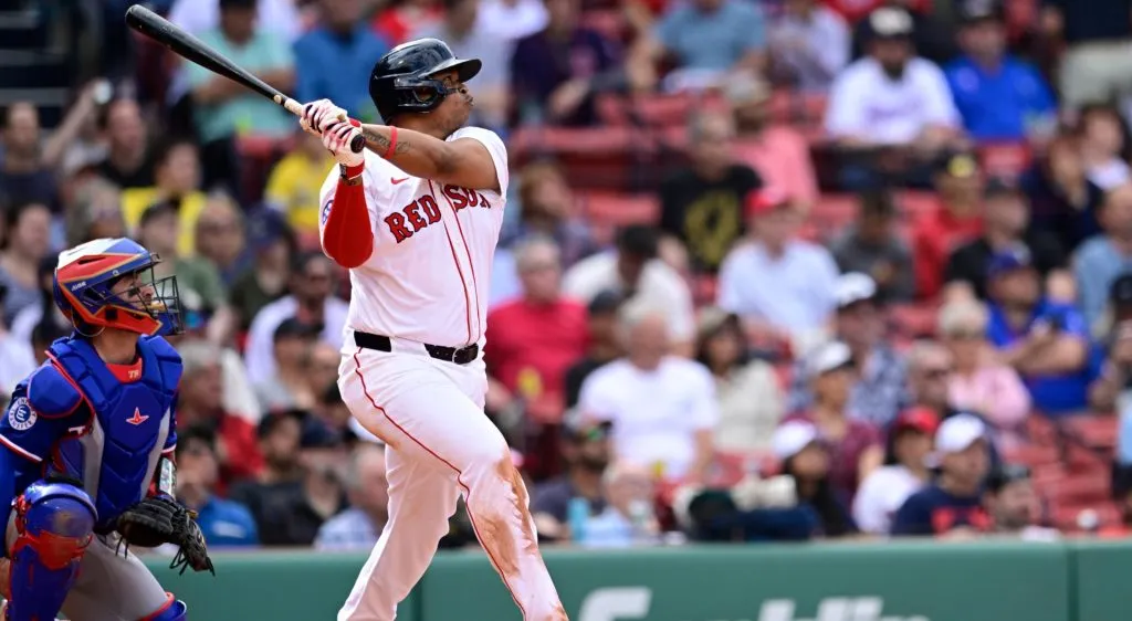 Rafael Devers #11 of the Boston Red Sox looks on after hitting a one-run home run in the seventh inning against the Texas Rangers at Fenway Park on May 08, 2025 in Boston, Massachusetts. (Photo by Jaiden Tripi/Getty Images)