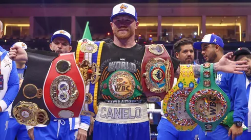 Saul "Canelo" Alvarez poses with his belts after beating William Scull to win the Super- Middleweight World Championship on the Fatal Fury City of Wolves card at ANB Arena on May 03, 2025 in Riyadh, Saudi Arabia.