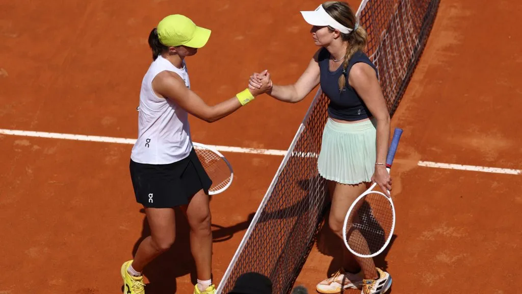 Danielle Collins of United States shakes hands with Iga Swiatek of Poland at the net after their Women’s Singles Third Round match of the Rome Open. (Dan Istitene/Getty Images)